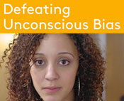 Yellow box that reads "Defeating Unconscious Bias" above an image of a woman's face